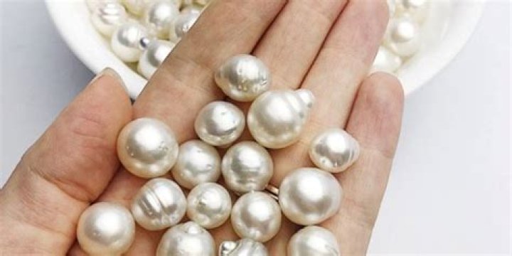 Are real pearls heavier than fake pearls?