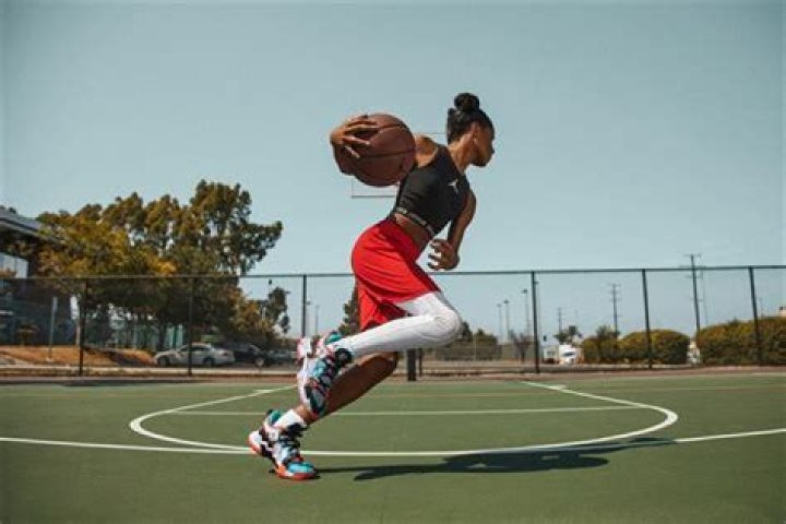 Can a goalie dribble the ball into the box and pick it up?