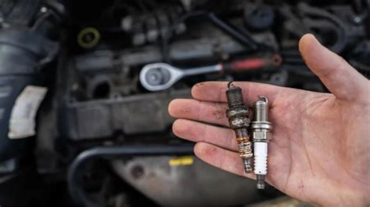Can bad spark plugs cause a gas smell?