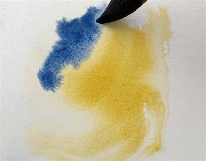 Can I paint on wet gesso?