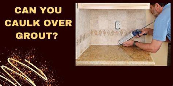Can you caulk over grout?