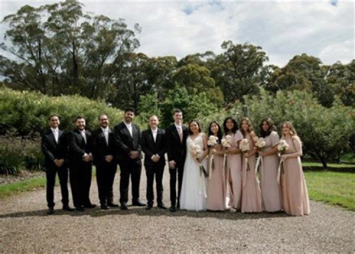 Do the bridesmaids and groomsmen walk together?