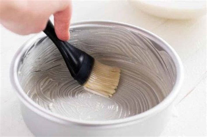 Do you need to grease the sides of a cake pan?