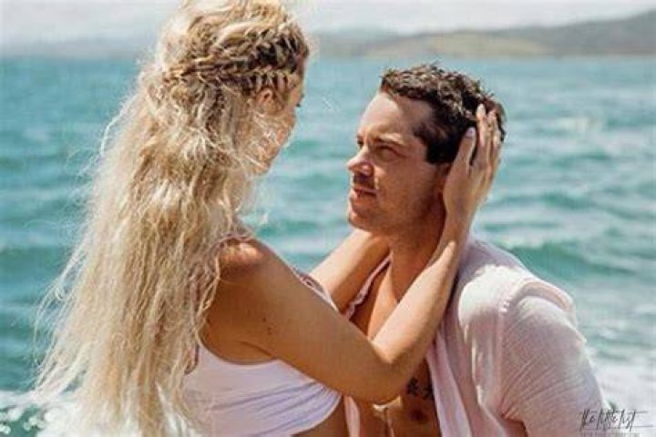Does Jake choose April or Rae?
