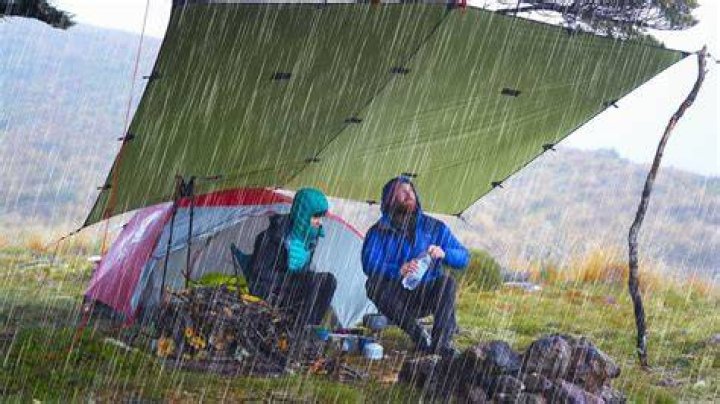 How do I protect my camping tent in the rain?