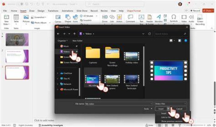 How do you add a video from camera roll to PowerPoint?