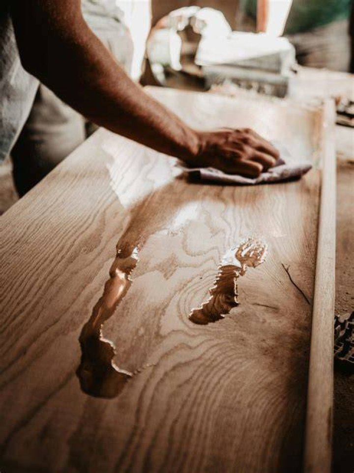How do you maintain a solid wood table?