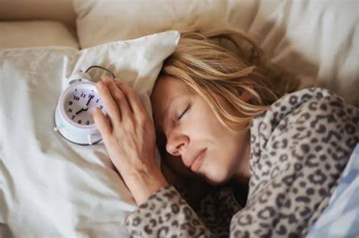 How do you wake up a heavy sleeper?