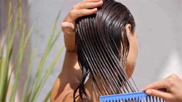 Is it better to brush hair in shower or after?