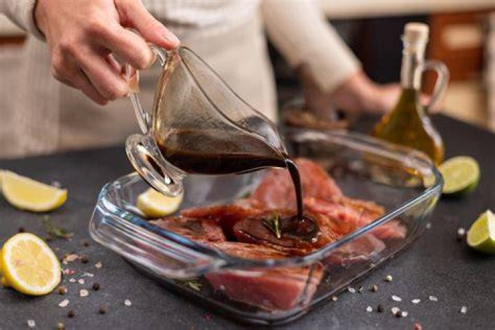 Is it OK to marinate meat in a plastic container?