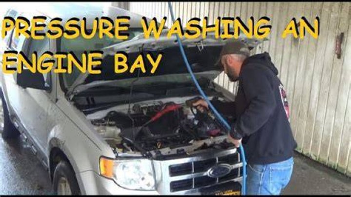 Is it safe to power wash a car engine?