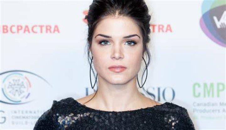 Is Marie Avgeropoulos a criminal?