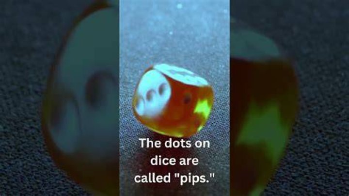 What are the black dots on dice called?