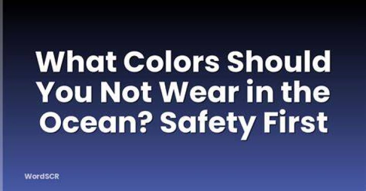 What colors should you not wear in the ocean?