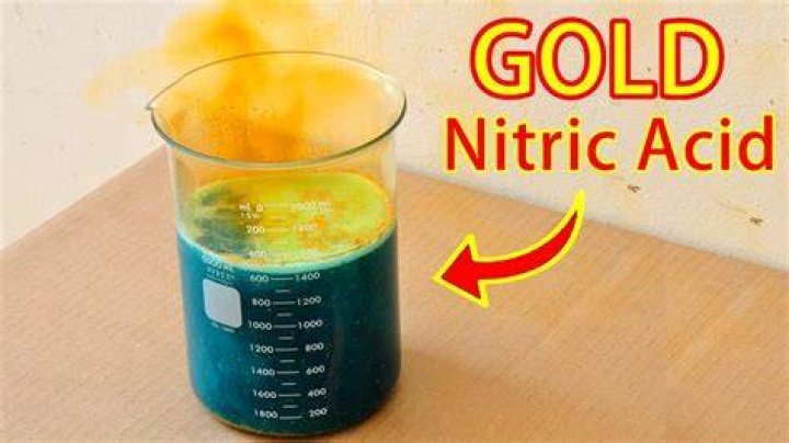 What happens when you put nitric acid on gold?