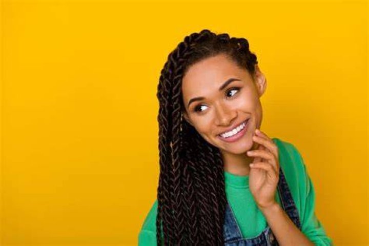 What should I put on my hair before braiding?