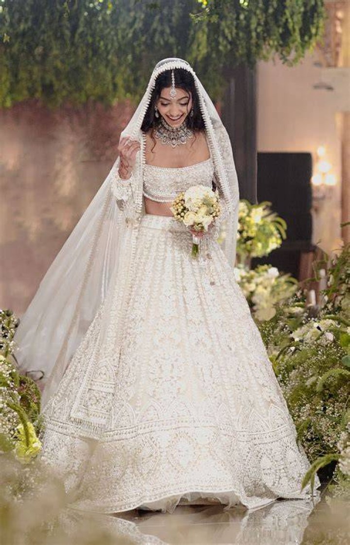 Who dresses the bride on her wedding day?