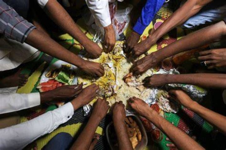 Why do Africans eat with their hands?