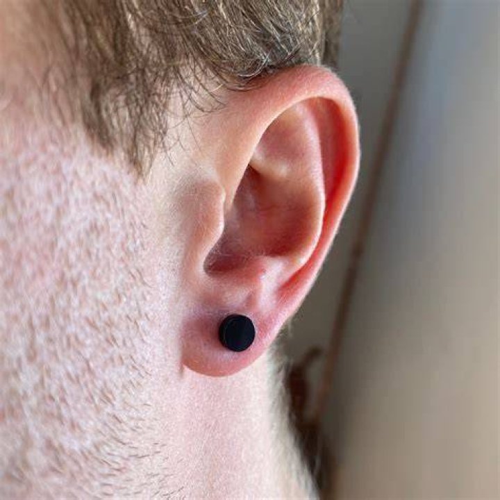 Why do my ears turn my earrings black?