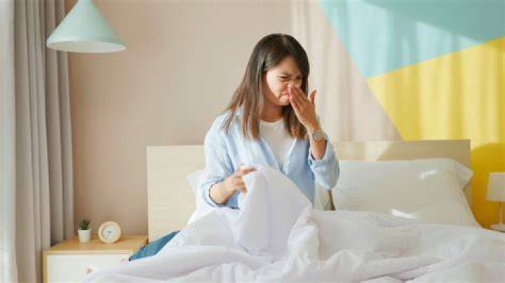 Why does my bedroom smell after sleeping?