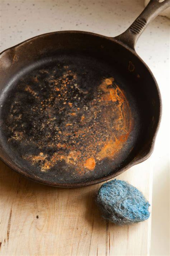 Why does my cast iron skillet rust after each use?