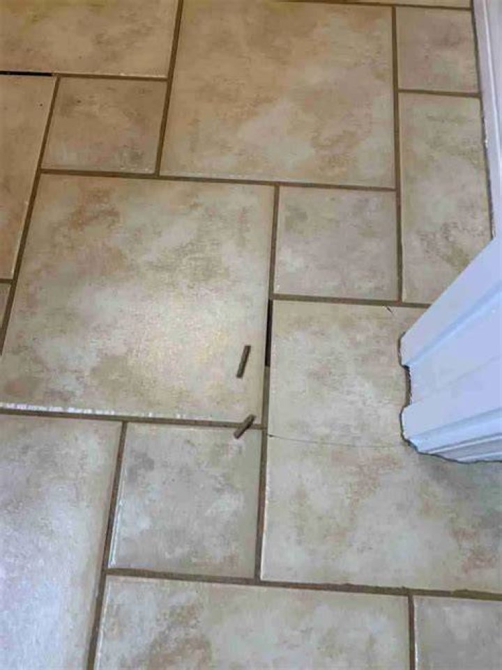 Why has my new grout gone yellow?